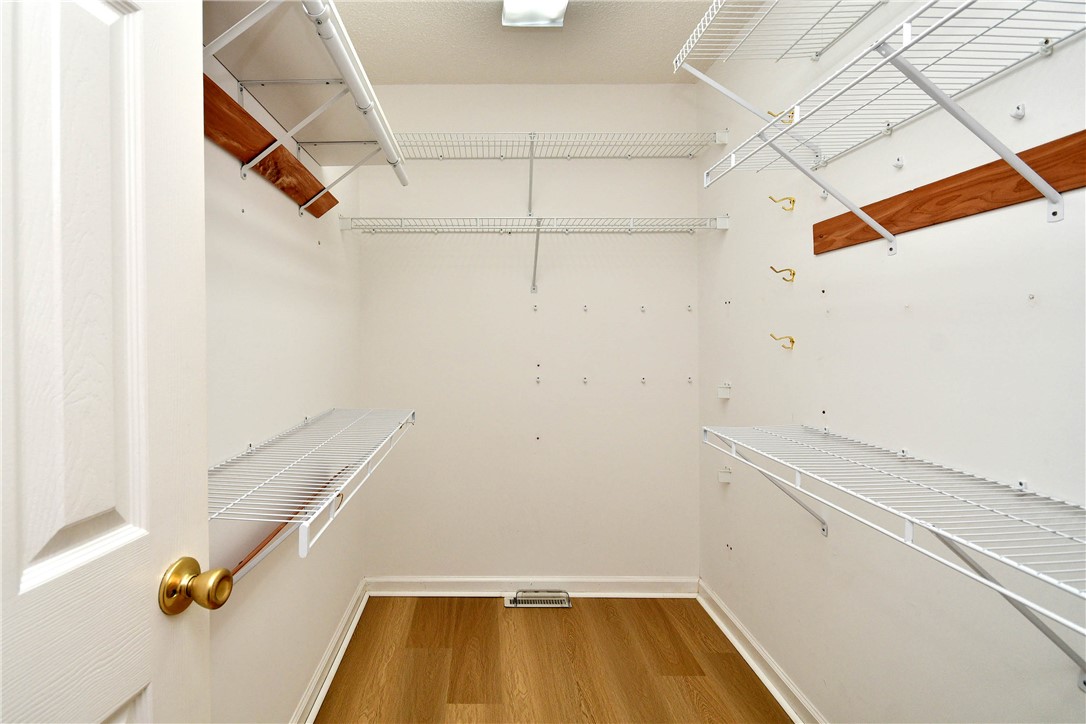 103 Baldwin Place Easley, SC 29642 - Photo 37 of 42 This spacious walk-in closet offers ample storage and organization for any wardrobe.