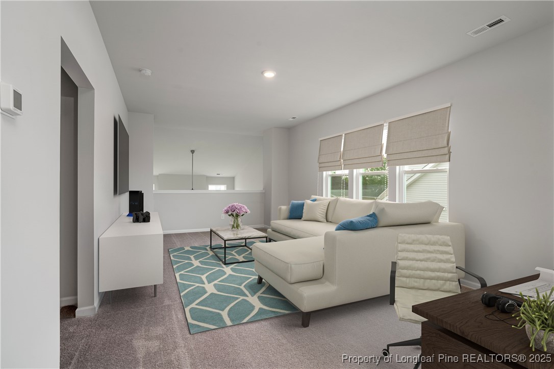 514 Log Pond Road Fayetteville, NC 28311 - Photo 4 of 5 a living room with furniture and a window