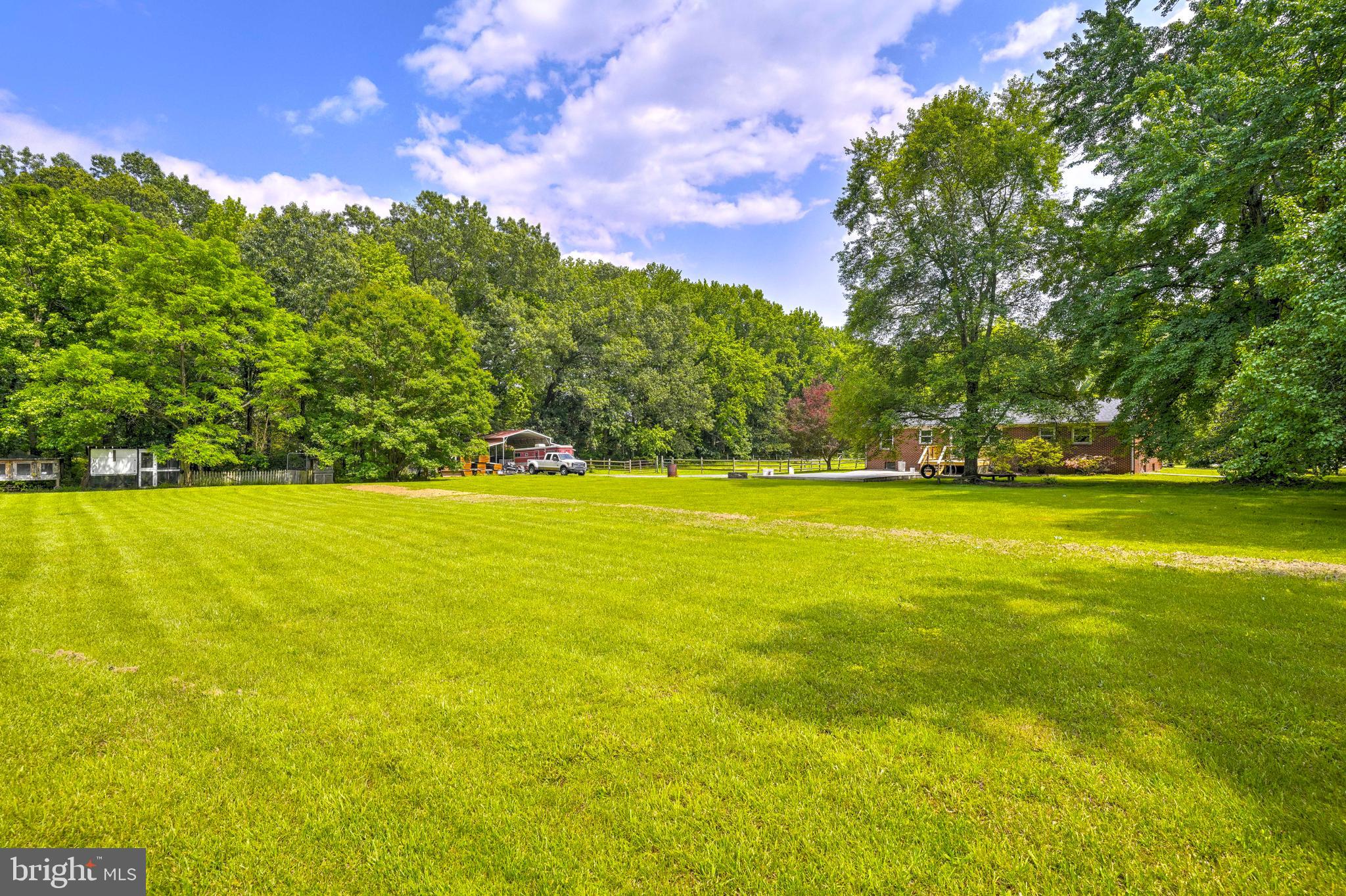 8920 Marshall Corner Road Pomfret, MD 20675 - Photo 24 of 31 a view of swimming pool with an outdoor space and seating area