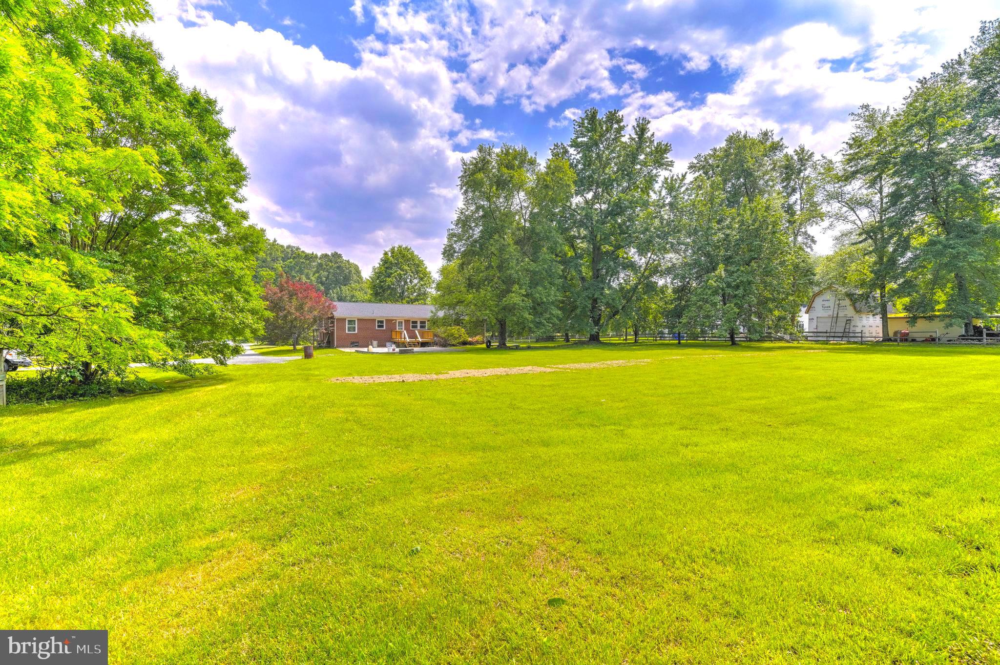 8920 Marshall Corner Road Pomfret, MD 20675 - Photo 6 of 31 a view of an ocean and a yard