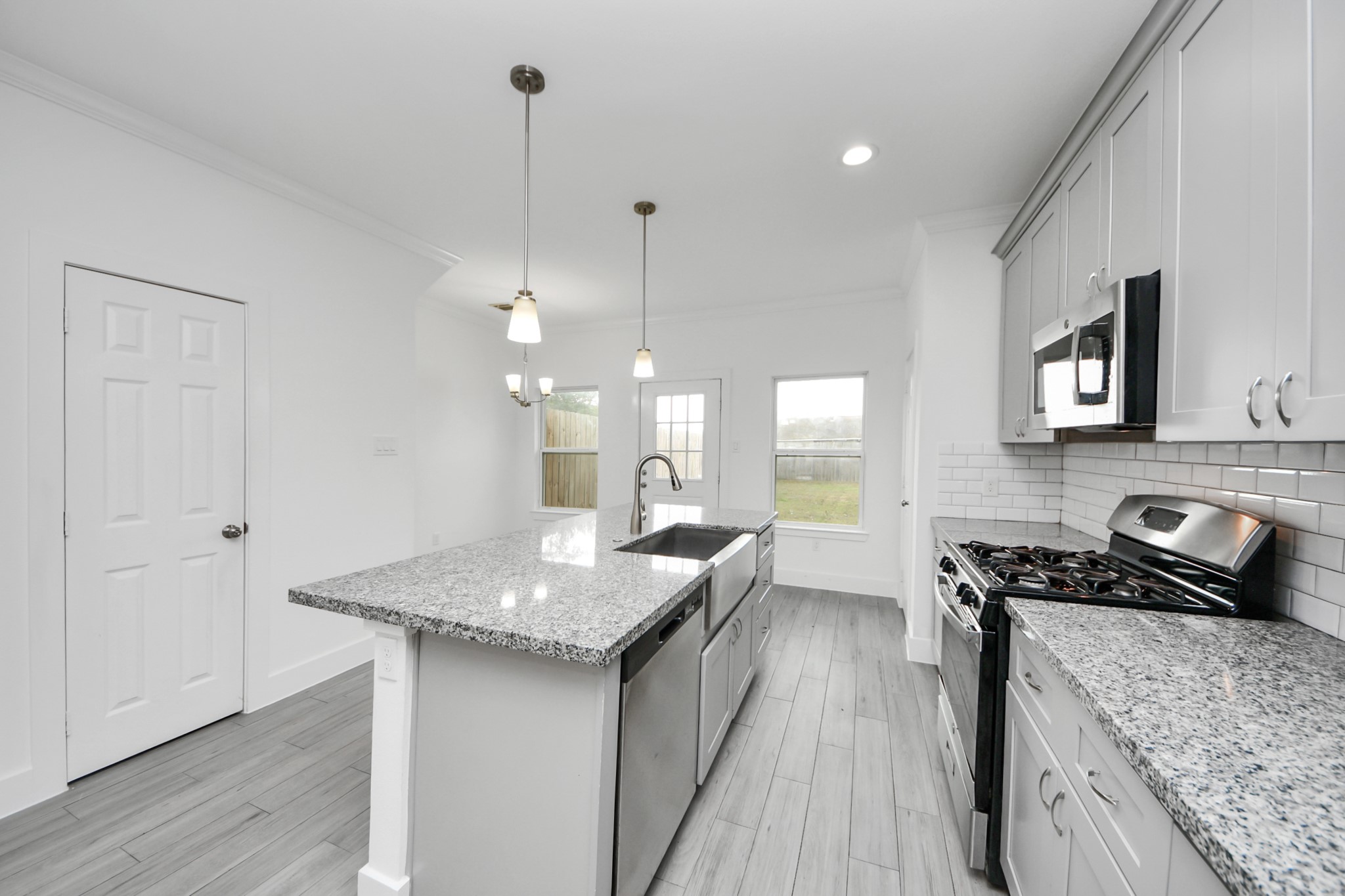 8305 Prairie View Drive, Unit B Houston, TX 77088 - Photo 12 of 22 Open kitchen with views of the private yard