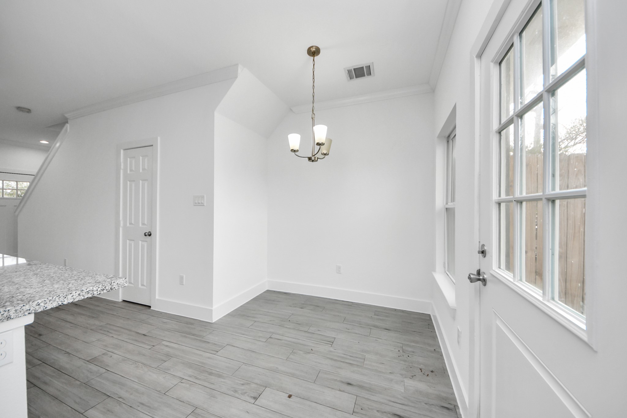 8305 Prairie View Drive, Unit B Houston, TX 77088 - Photo 13 of 22 Dining area with backyard views