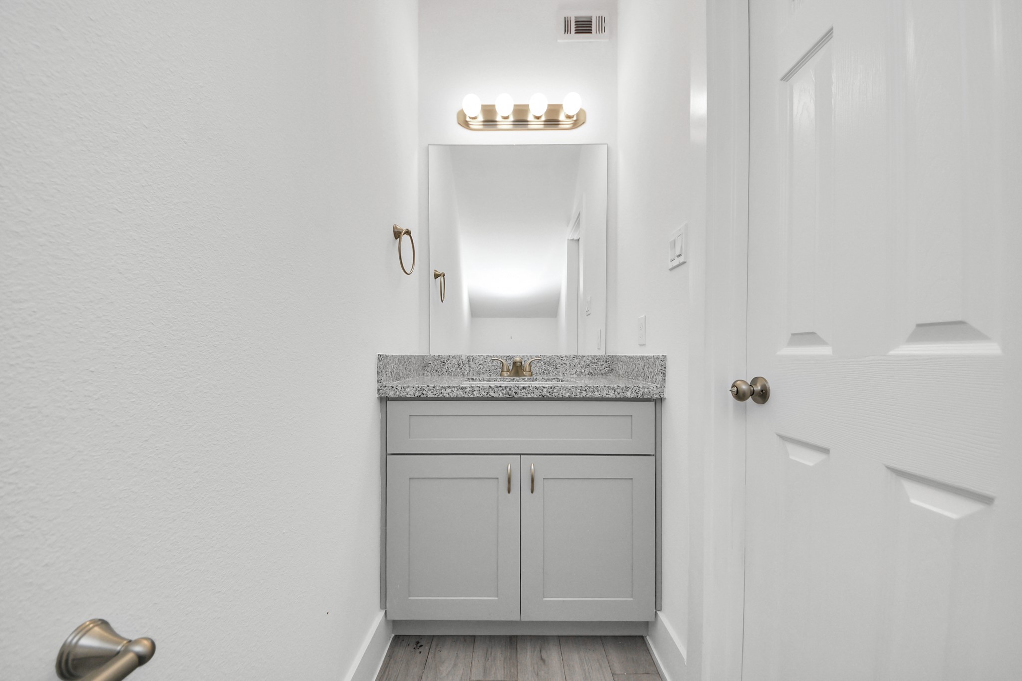 8305 Prairie View Drive, Unit B Houston, TX 77088 - Photo 14 of 22 Sleek half bath perfect for guests convenience