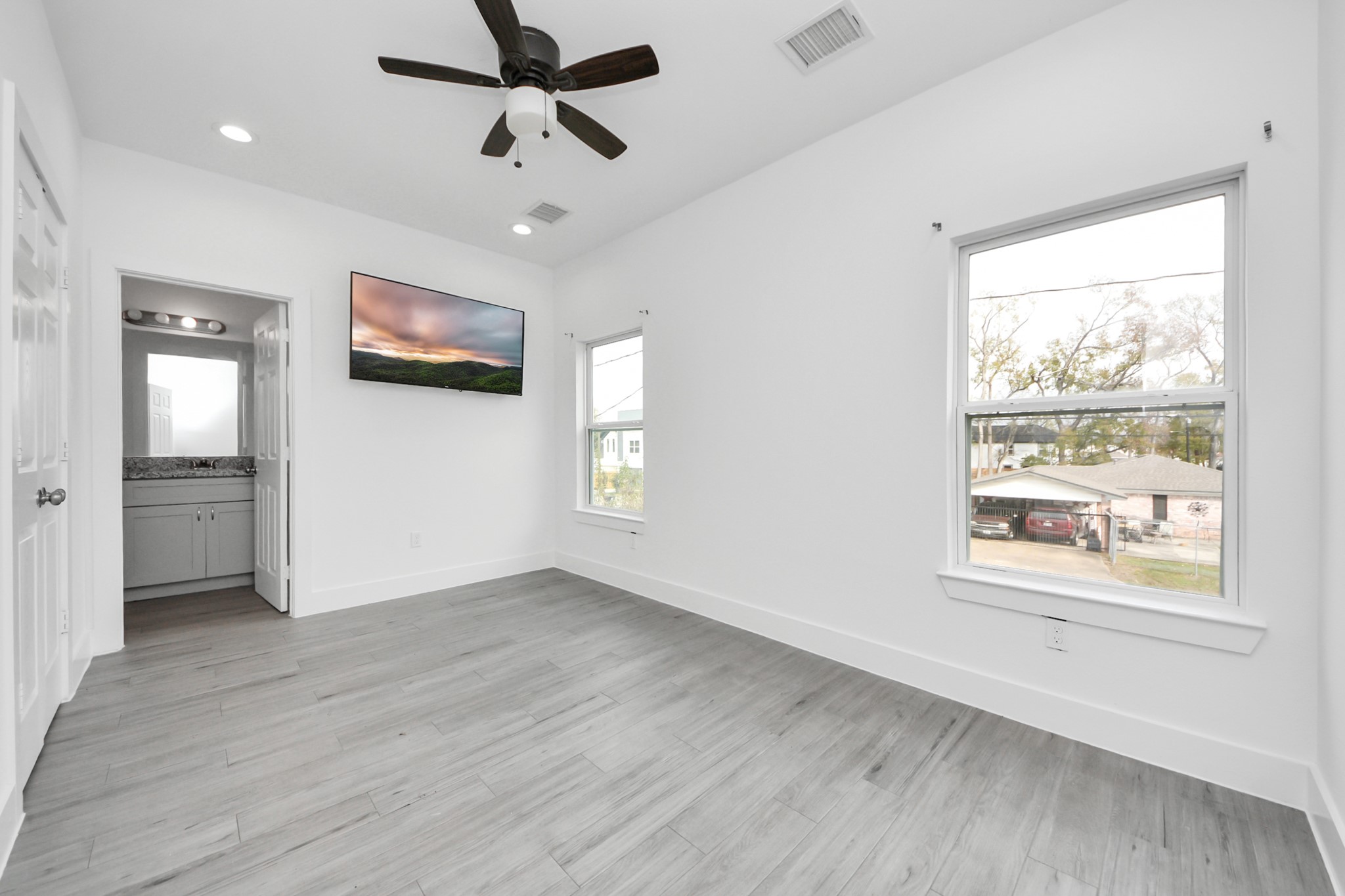 8305 Prairie View Drive, Unit B Houston, TX 77088 - Photo 15 of 22 Spacious primary bedroom with ample natural light