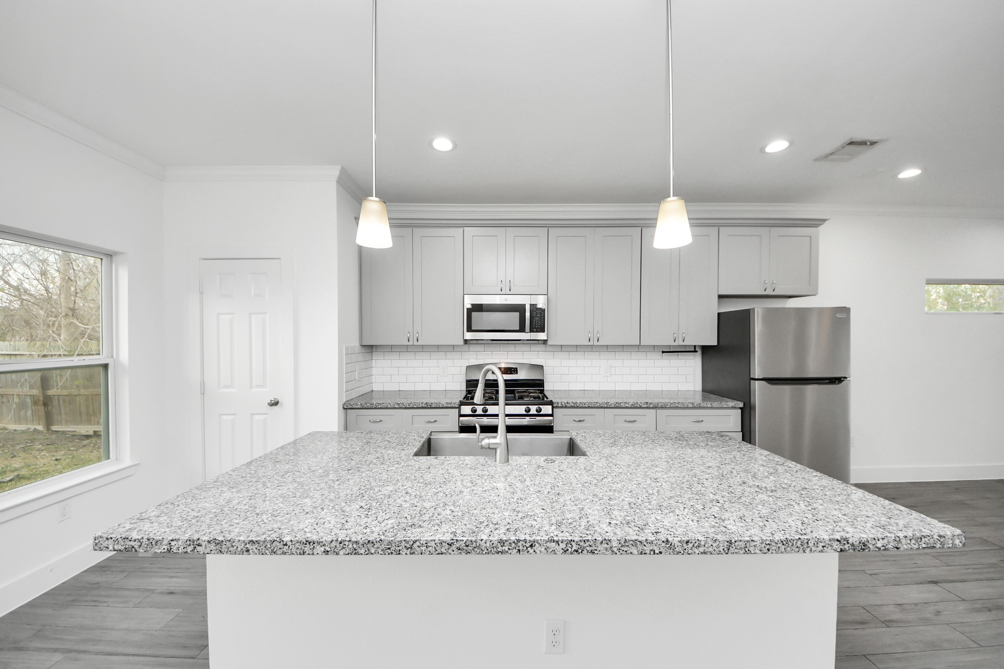 8305 Prairie View Drive, Unit B Houston, TX 77088 - Photo 9 of 22 Spacious island with pendant lighting