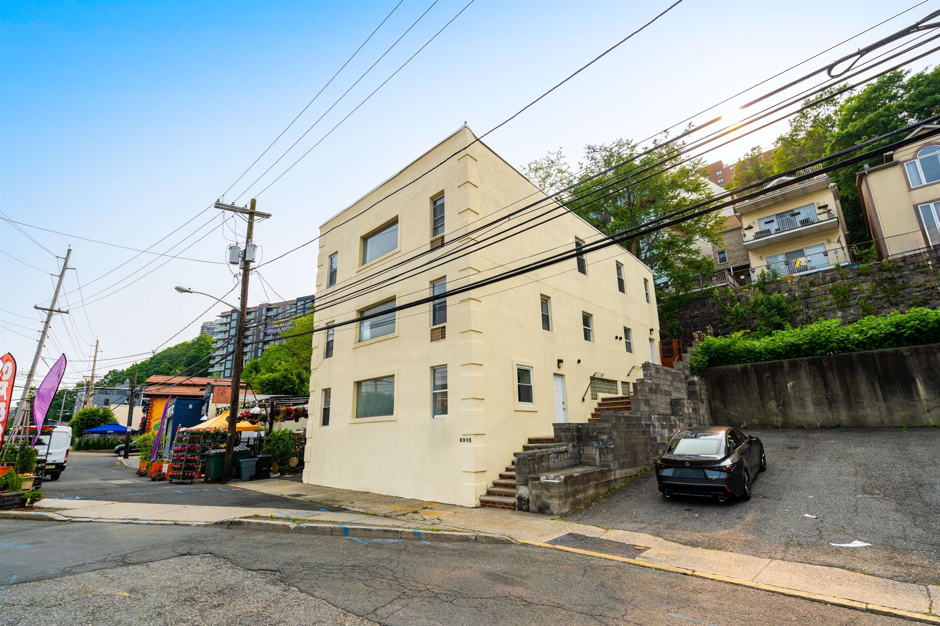 8905 Old River Road, Unit 3 Edgewater, NJ 07047 - Photo 16 of 18 a view of a street with cars