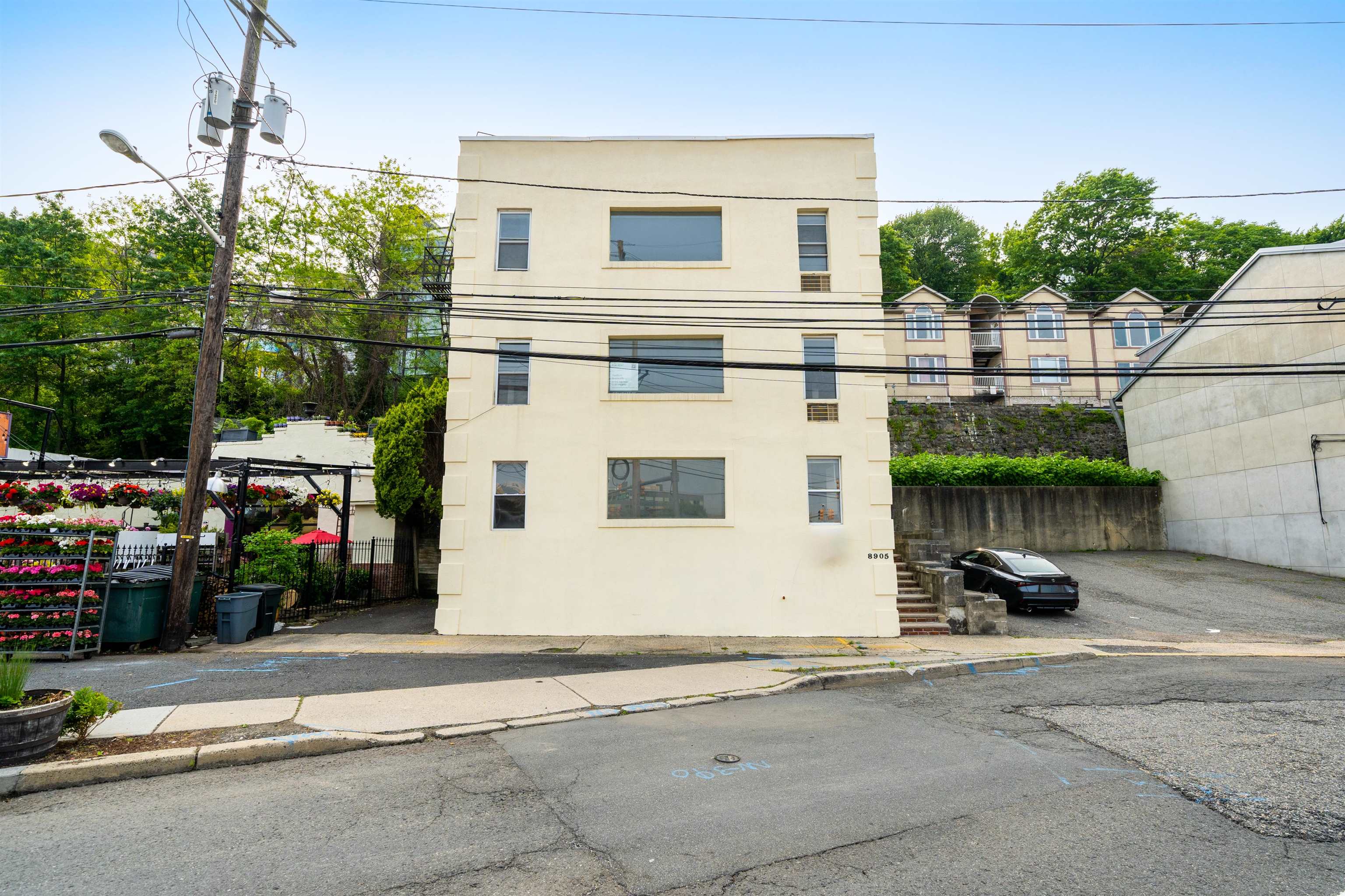 8905 Old River Road, Unit 3 Edgewater, NJ 07047 - Photo 17 of 18 a view of a street with cars