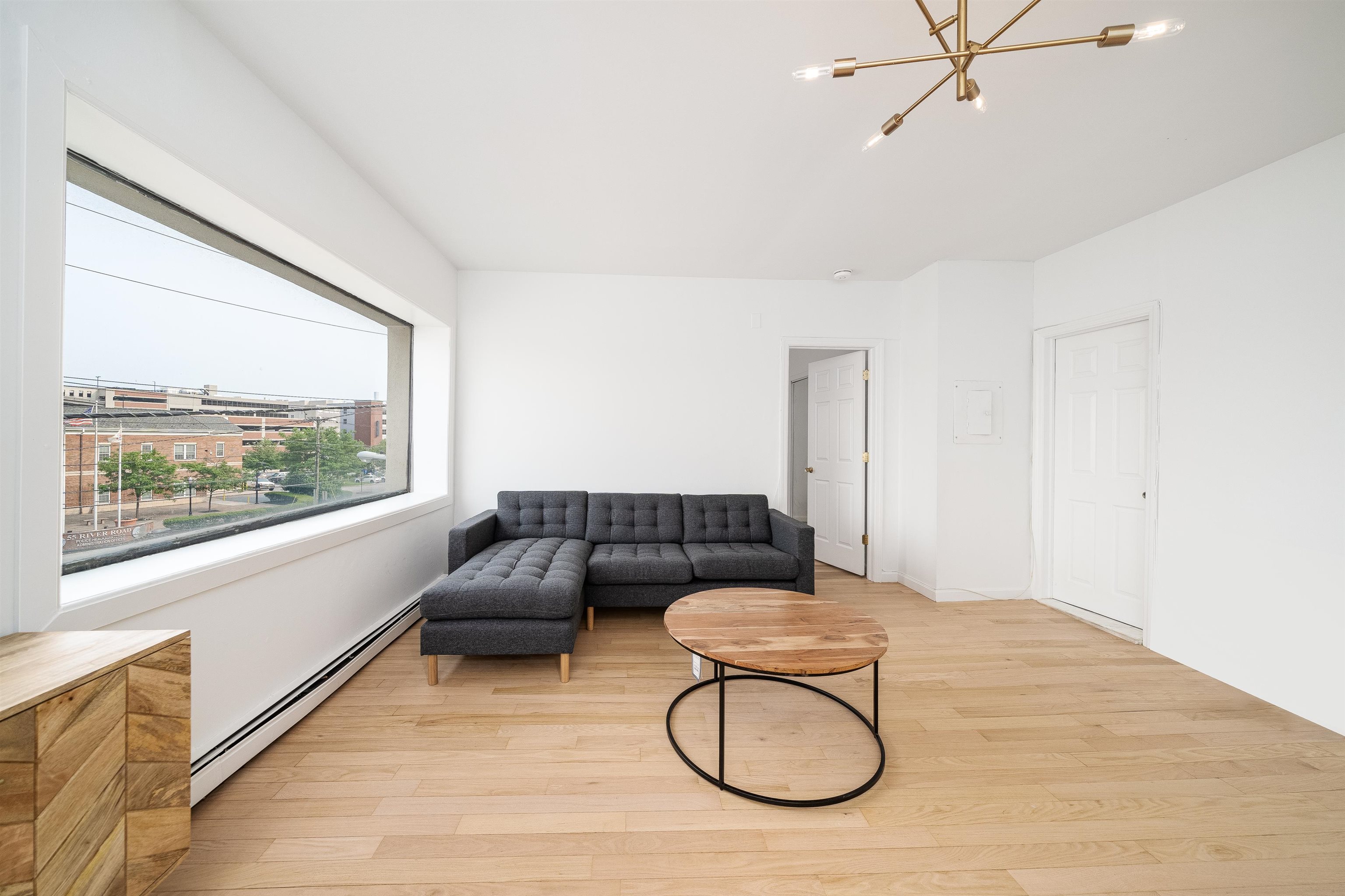 8905 Old River Road, Unit 3 Edgewater, NJ 07047 - Photo 9 of 18 a living room with furniture