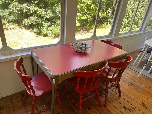 a view of a swimming pool with a yard