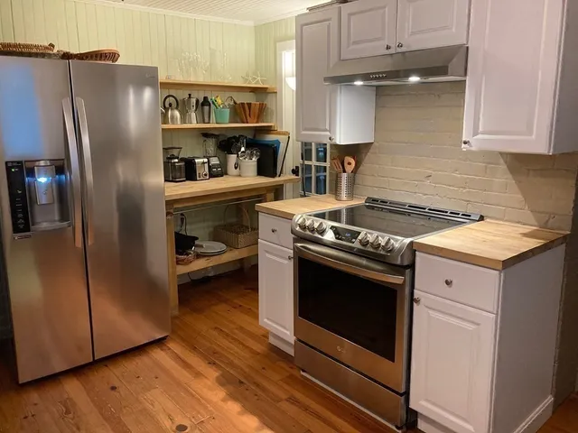 a view of a swimming pool with a yard