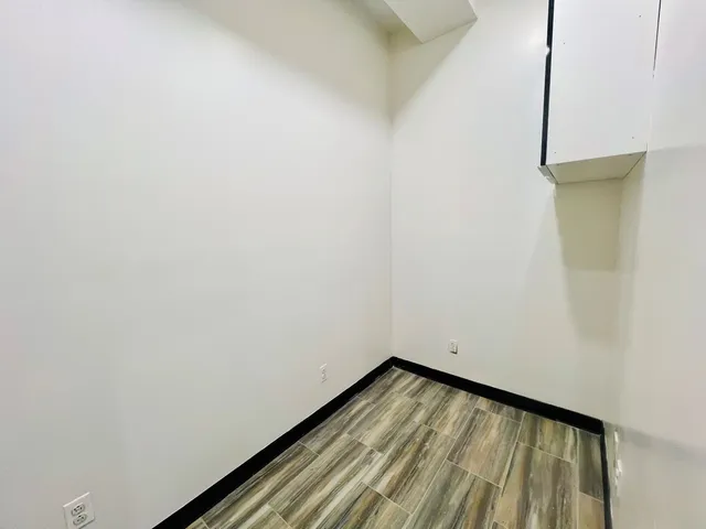 a view of kitchen with furniture and window