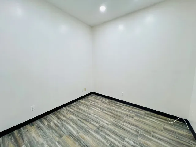 a bathroom with a sink toilet and mirror