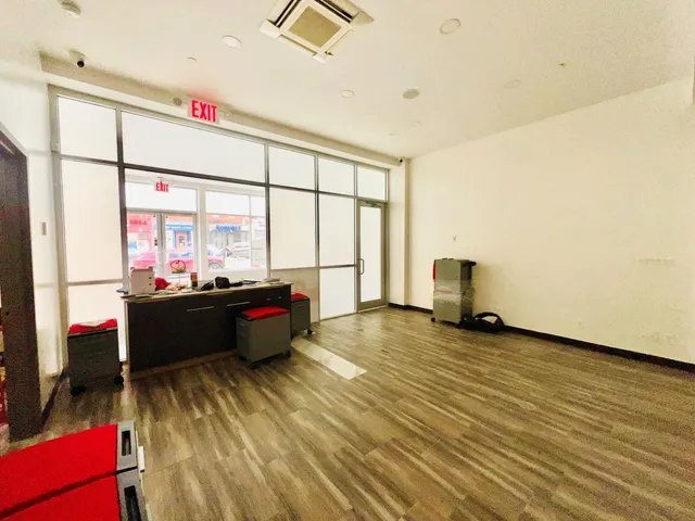 a room with a bed and a window