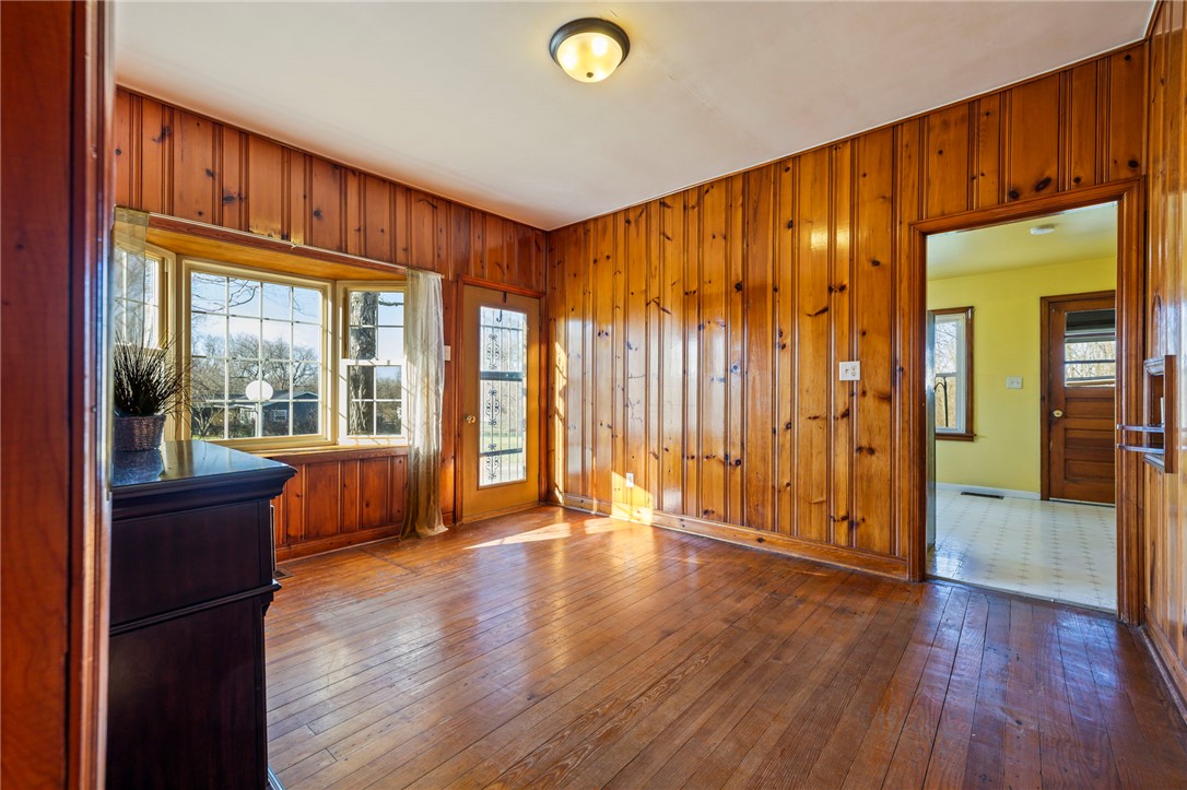 10797 Gratis Jacksonburg Road Somerville, OH 45064 - Photo 9 of 27 This warm space features hardwood floors and a charming bay window, perfect for creating a cozy atmosphere.