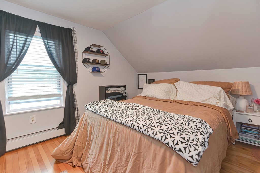 23 Dryden Street Worcester, MA 01605 - Photo 17 of 23 a bedroom with a bed and a window