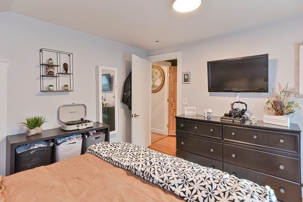23 Dryden Street Worcester, MA 01605 - Photo 18 of 23 a living room with furniture and a flat screen tv