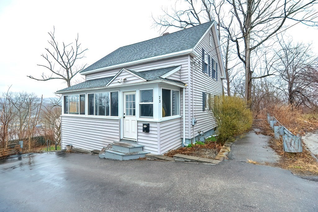 23 Dryden Street Worcester, MA 01605 - Photo 2 of 23 a front view of a house with a yard