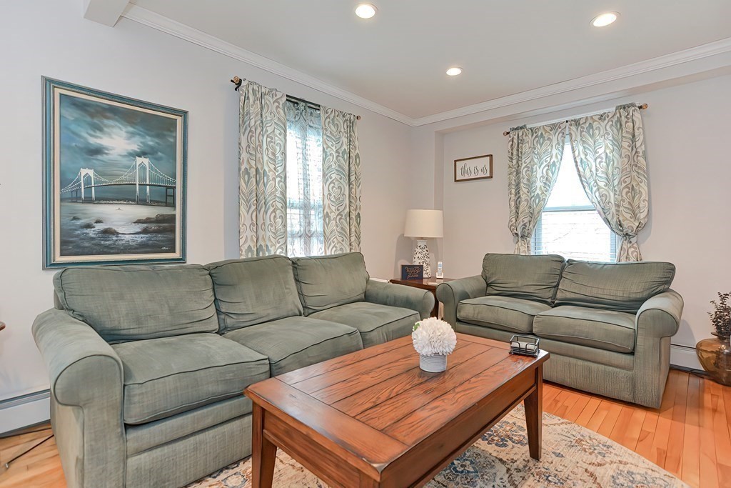23 Dryden Street Worcester, MA 01605 - Photo 9 of 23 a living room with furniture and a window