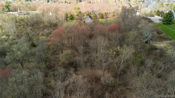a aerial view of residential houses with outdoor space