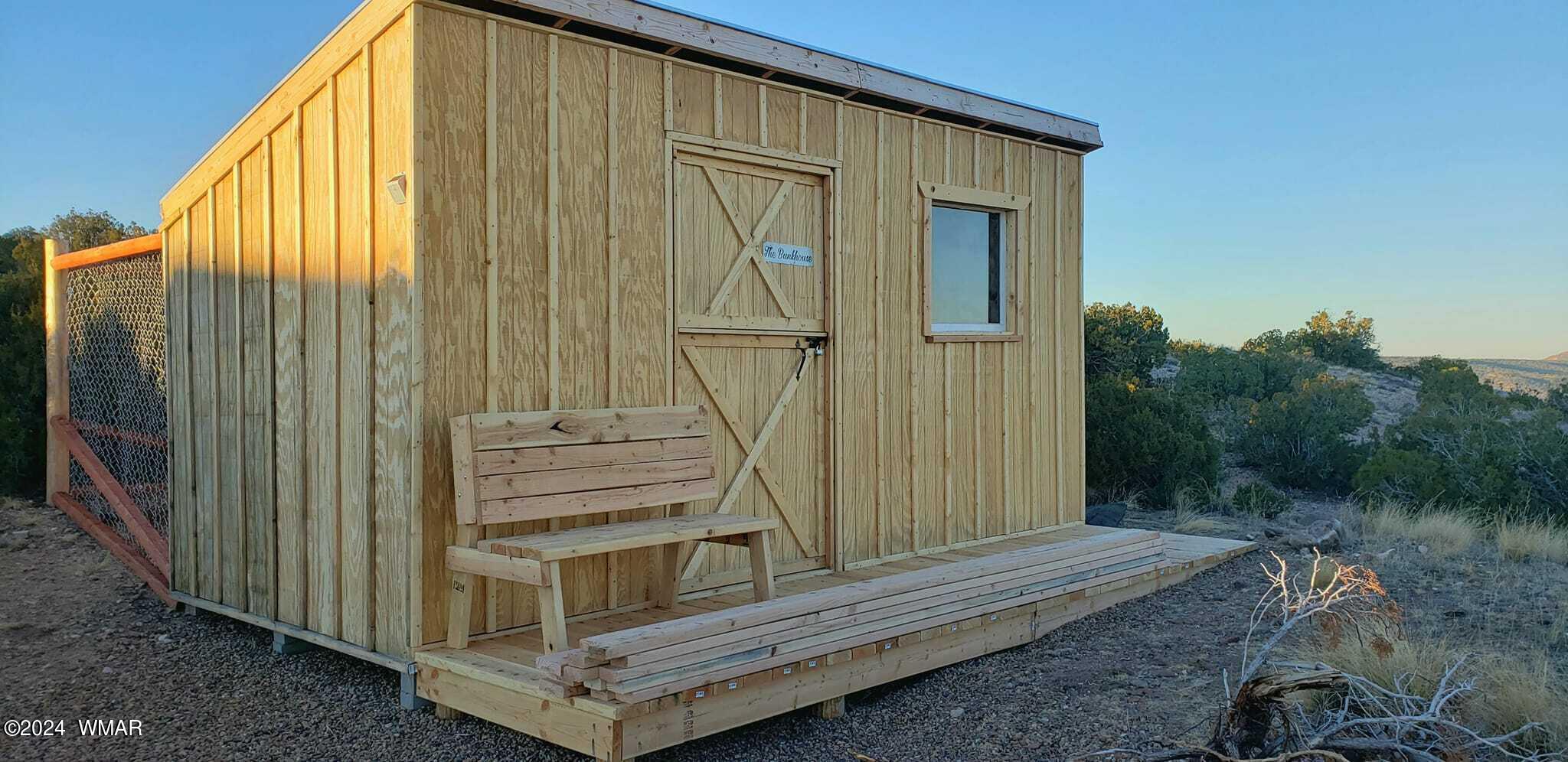 114 County Road Concho, AZ 85924 - Photo 6 of 10 8' x 16' Workshop with Cyclone Fenced Kennel
