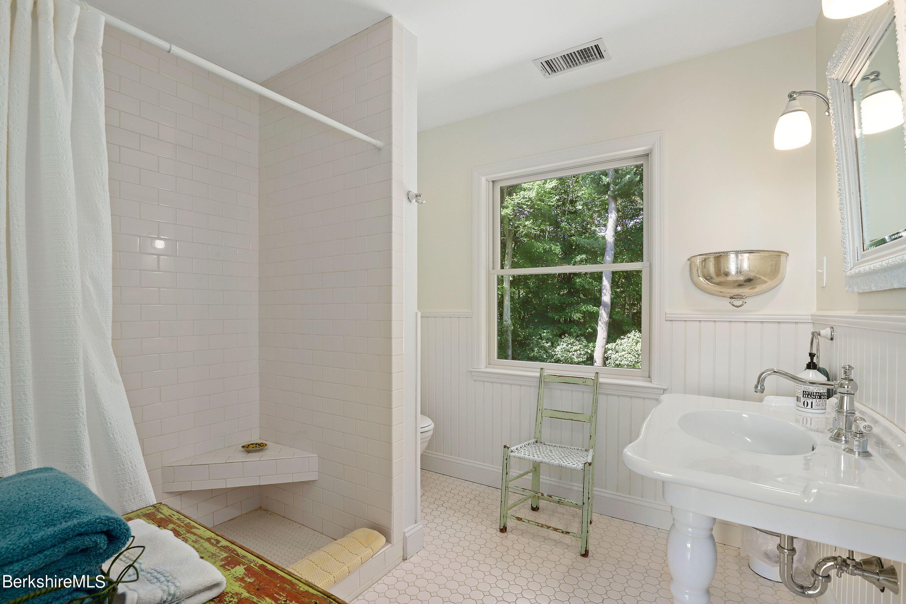 271 B Lakeview Road Craryville, NY 12521 - Photo 20 of 23 a bathroom with a sink and a window