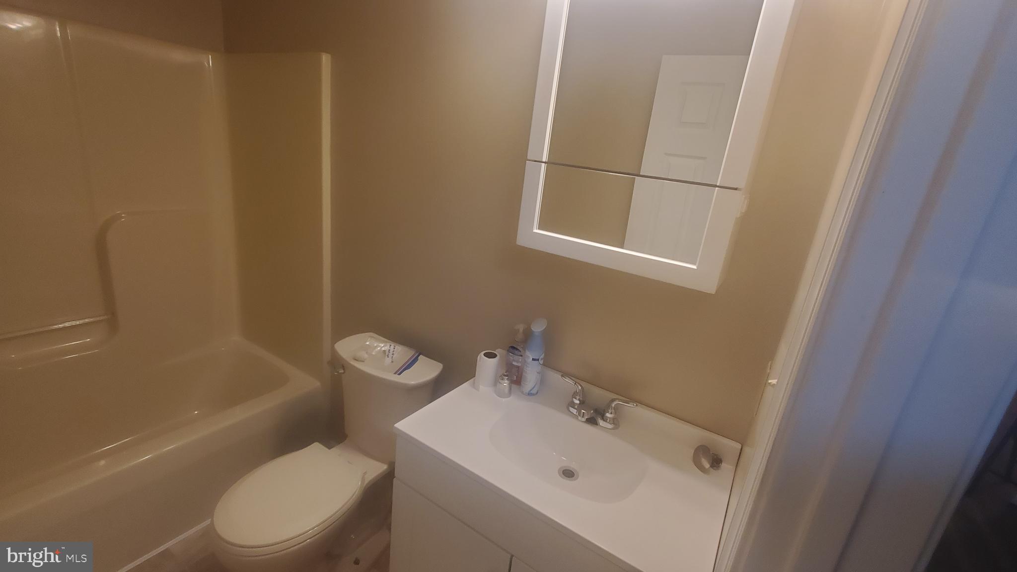 1292 South Ox Road Woodstock, VA 22664 - Photo 22 of 24 a bathroom with a sink toilet and shower