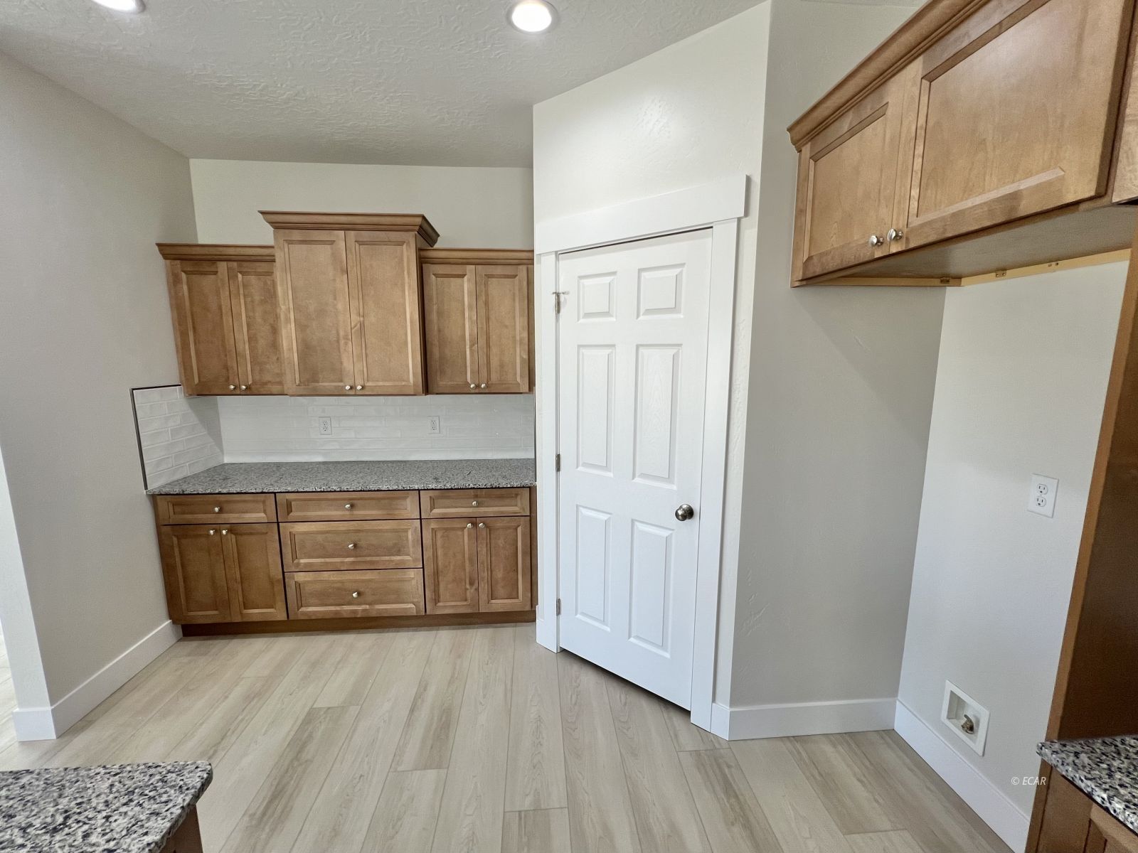 518 Ridgeway Drive Spring Creek, NV 89815 - Photo 14 of 37 a kitchen with granite countertop cabinets and window