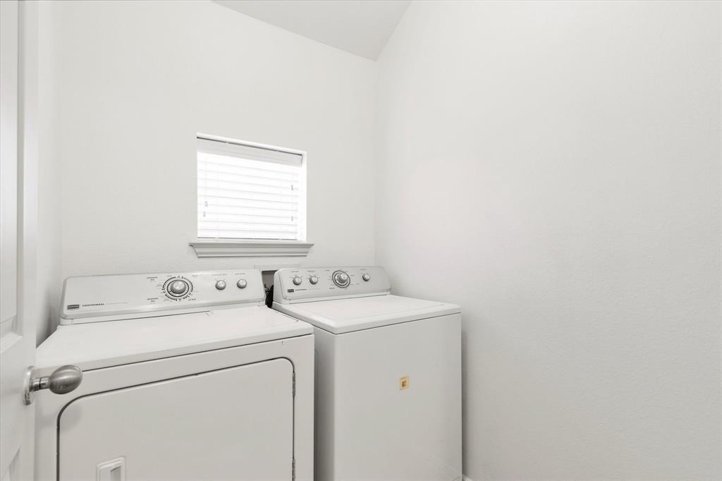 706 South Jupiter Road, Unit 1101 Allen, TX 75002 - Photo 24 of 31 a utility room with dryer and washer