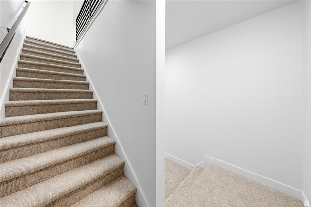 1491 East Centaurus Way, Unit 86 Washington, UT 84780 - Photo 10 of 26 Stairs featuring carpet and baseboards
