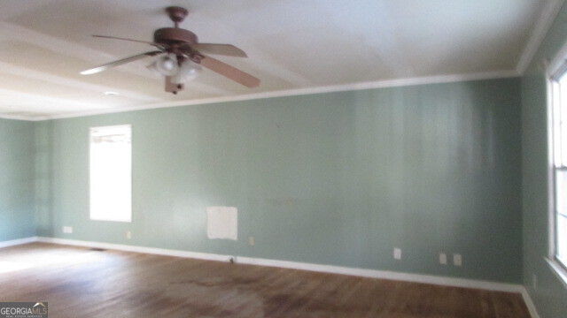180 Dean Road Greenville, GA 30222 - Photo 3 of 10 wooden floor in an empty room with a window