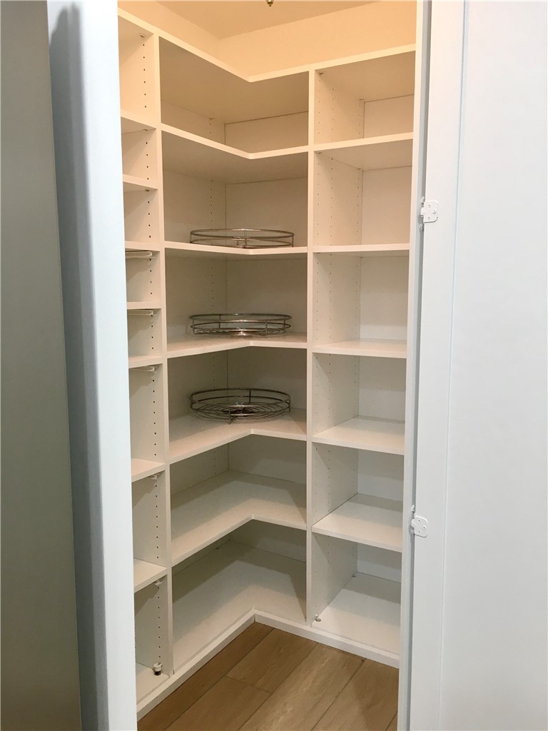 6 Dover Place Manhattan Beach, CA 90266 - Photo 3 of 25 a view of a room with rack on the wall