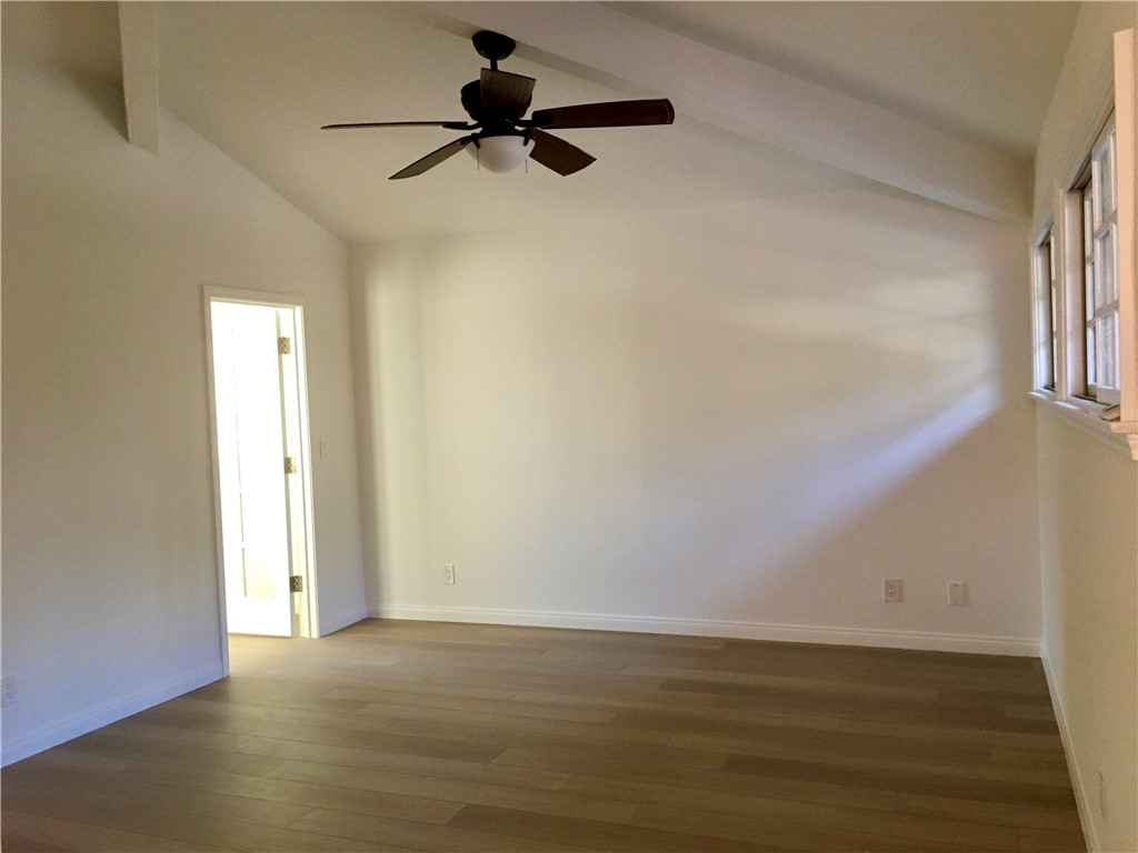 6 Dover Place Manhattan Beach, CA 90266 - Photo 6 of 25 a view of a livingroom with a ceiling fan & hardwood floor