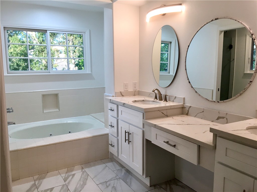 6 Dover Place Manhattan Beach, CA 90266 - Photo 10 of 25 a bathroom with a double vanity sink mirror and bathtub