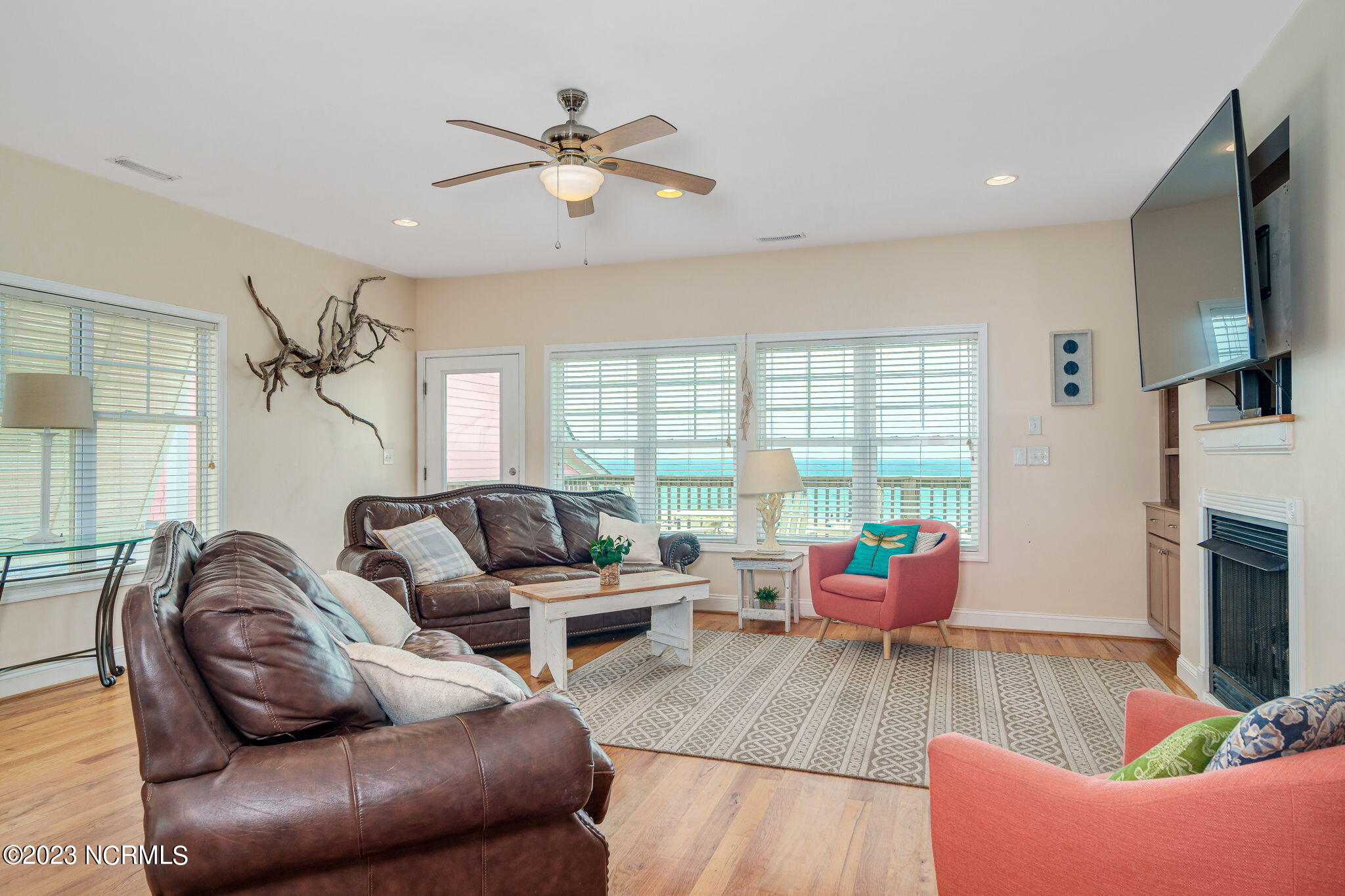 200 Ocean Boulevard Atlantic Beach, NC 28512 - Photo 3 of 75 Open living room w/ fireplace & views