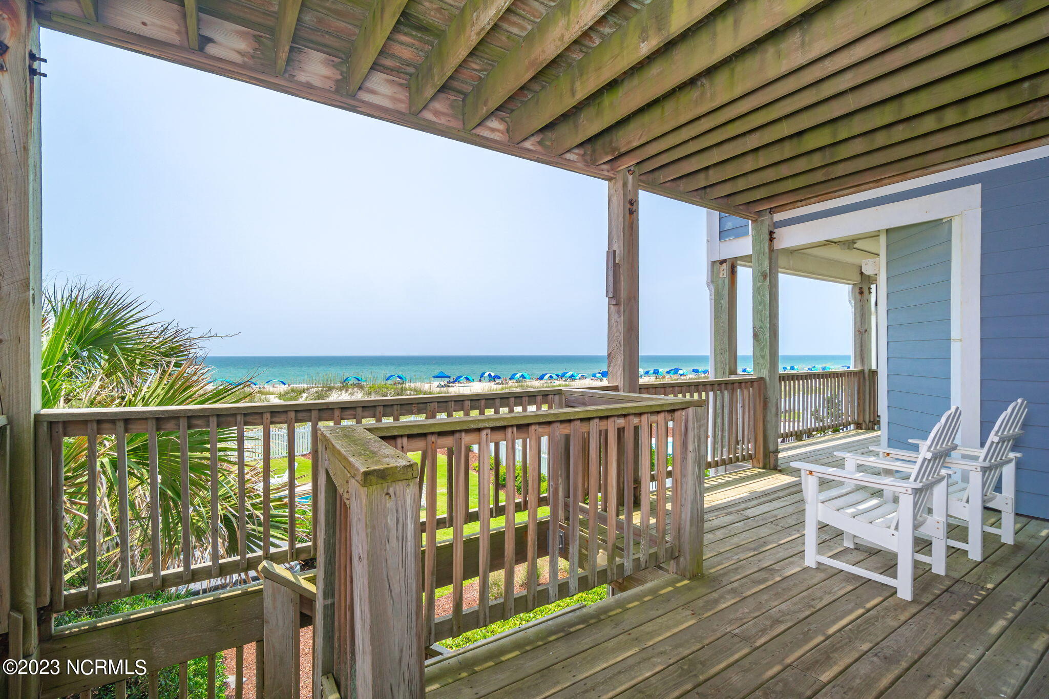 200 Ocean Boulevard Atlantic Beach, NC 28512 - Photo 31 of 75 Covered deck off guest bedrooms