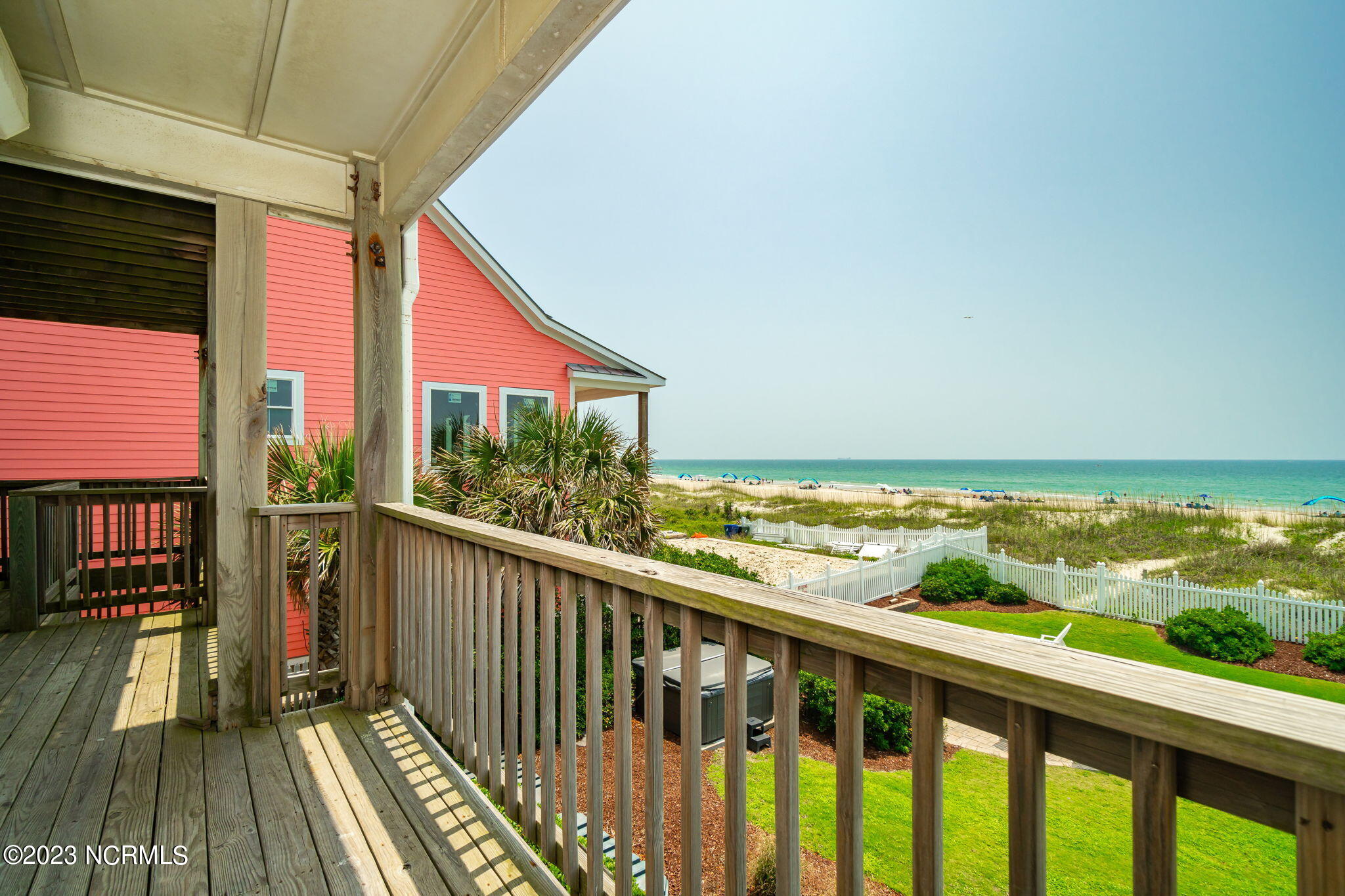 200 Ocean Boulevard Atlantic Beach, NC 28512 - Photo 33 of 75 Covered deck off guest bedrooms