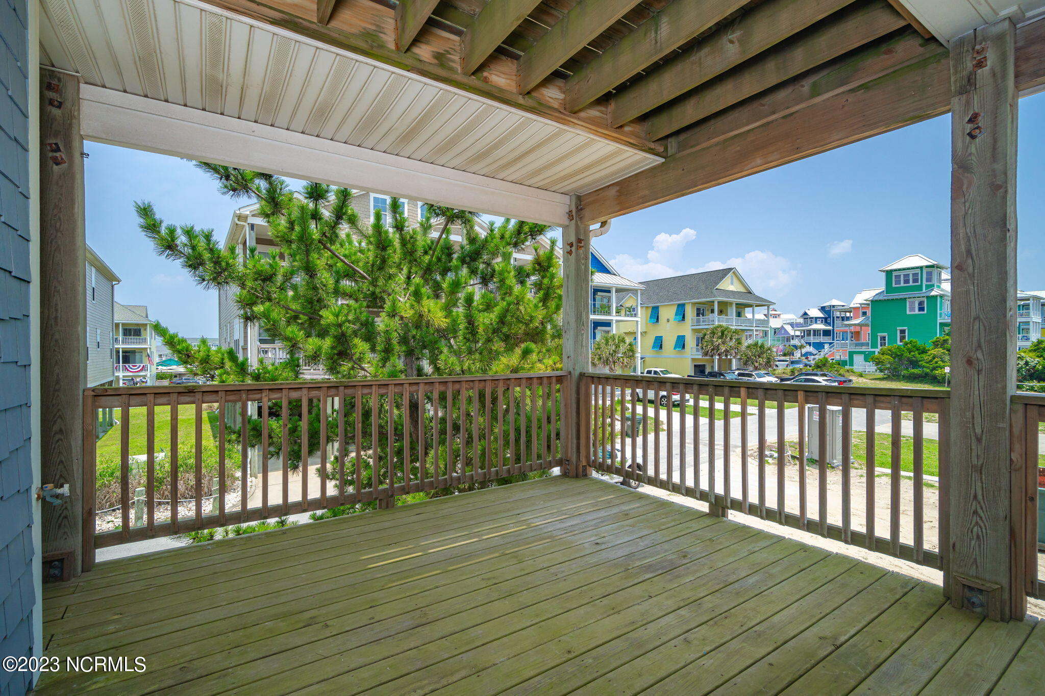 200 Ocean Boulevard Atlantic Beach, NC 28512 - Photo 41 of 75 Access to deck from guest bedroom as well