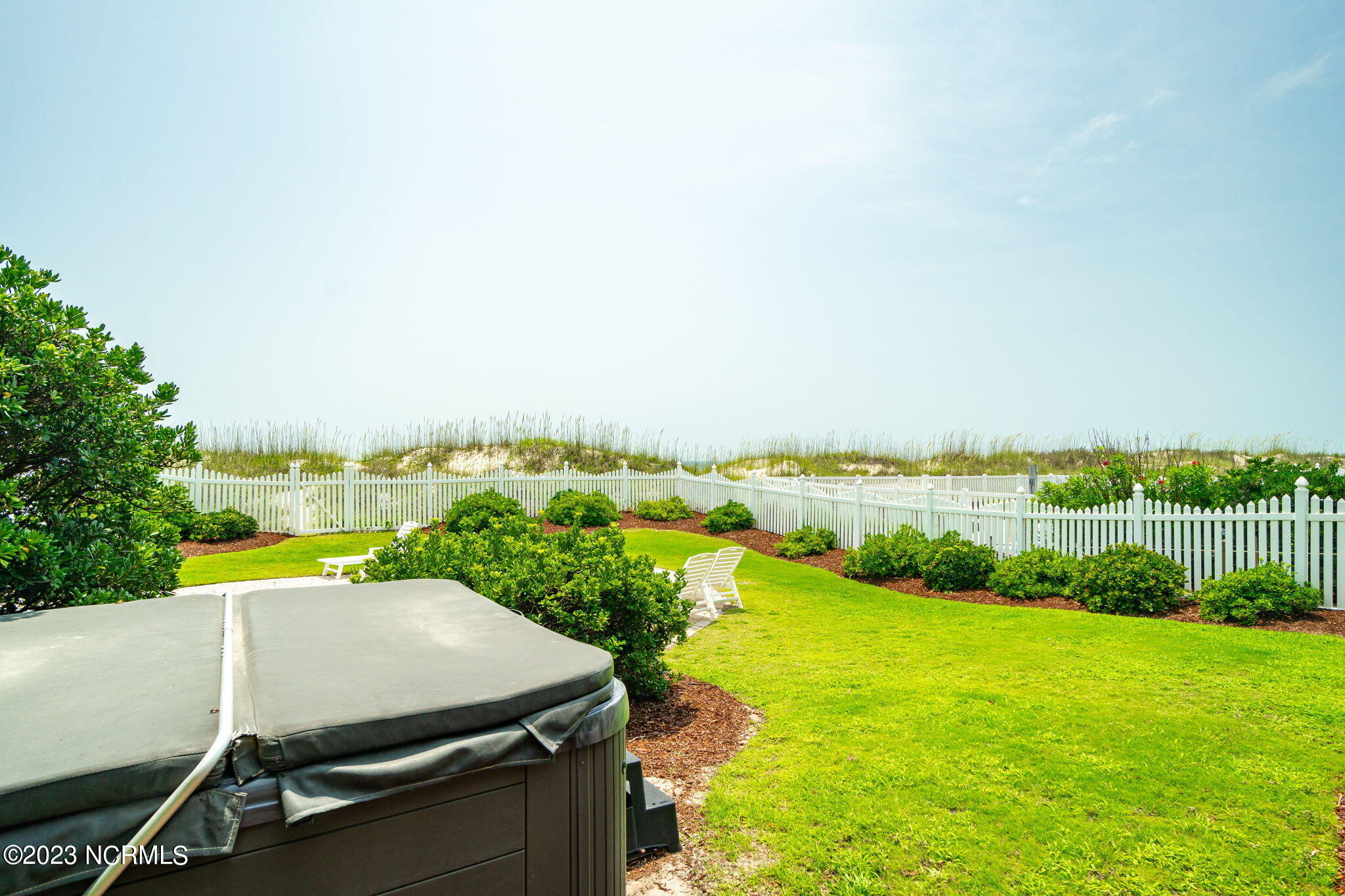 200 Ocean Boulevard Atlantic Beach, NC 28512 - Photo 53 of 75 Hot tub in back yard