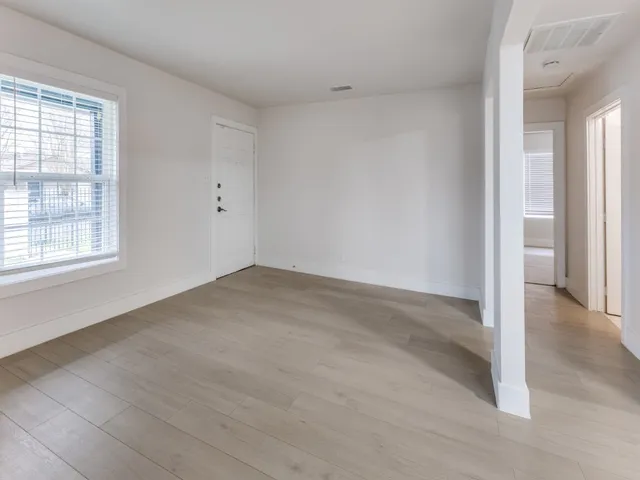 an empty room with windows