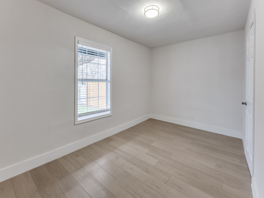 1108 Vasquez Street Austin, TX 78741 - Photo 22 of 33 an empty room with a window