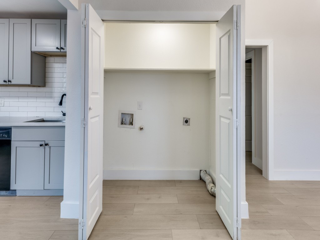 1108 Vasquez Street Austin, TX 78741 - Photo 27 of 33 a view of a kitchen with white cabinets