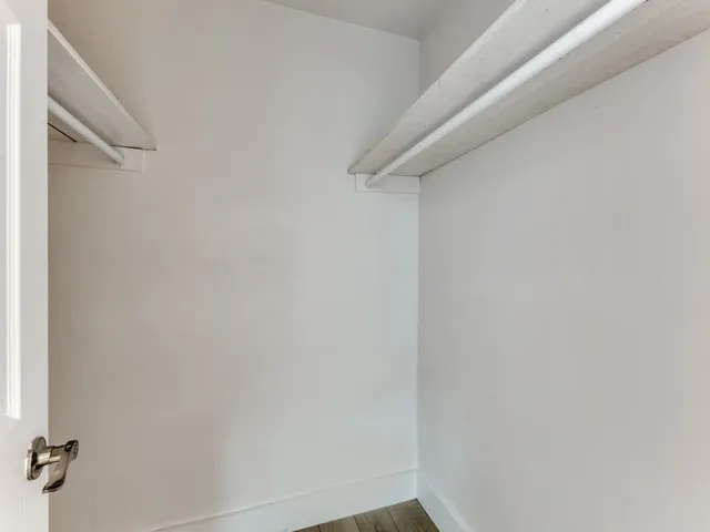 a view of small space with racks on the wall