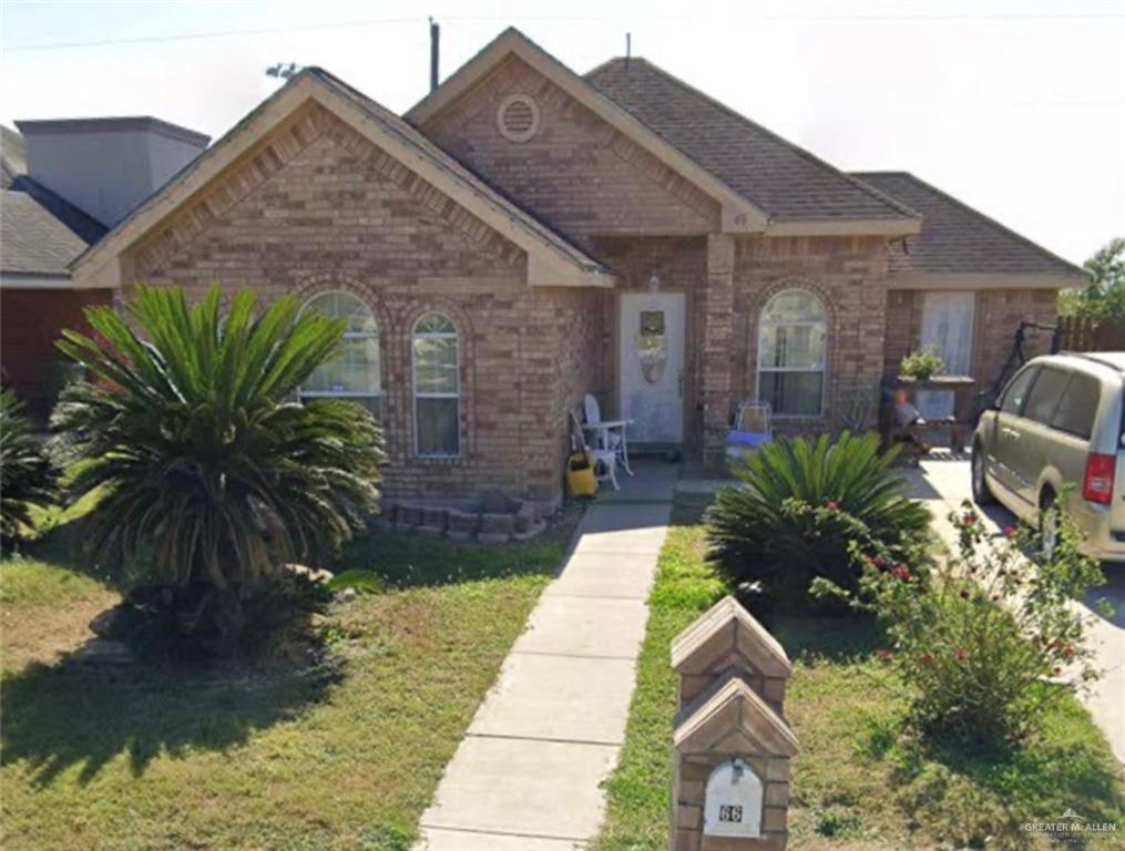 66 Santa Elena Lane Rio Grande City, TX 78582 - Photo 3 of 3 a house with garden in front of it