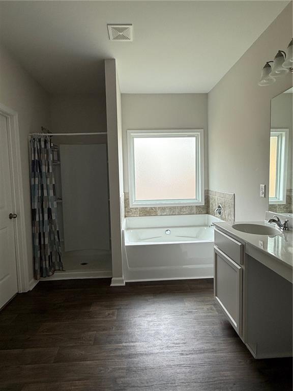 358 Mulberry Road Winder, GA 30680 - Photo 15 of 21 a bathroom with a tub sink and mirror
