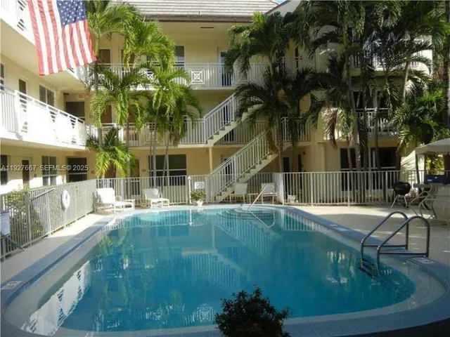 a view of a house with a swimming pool