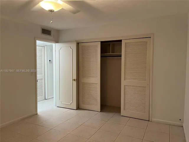 an empty room with closet