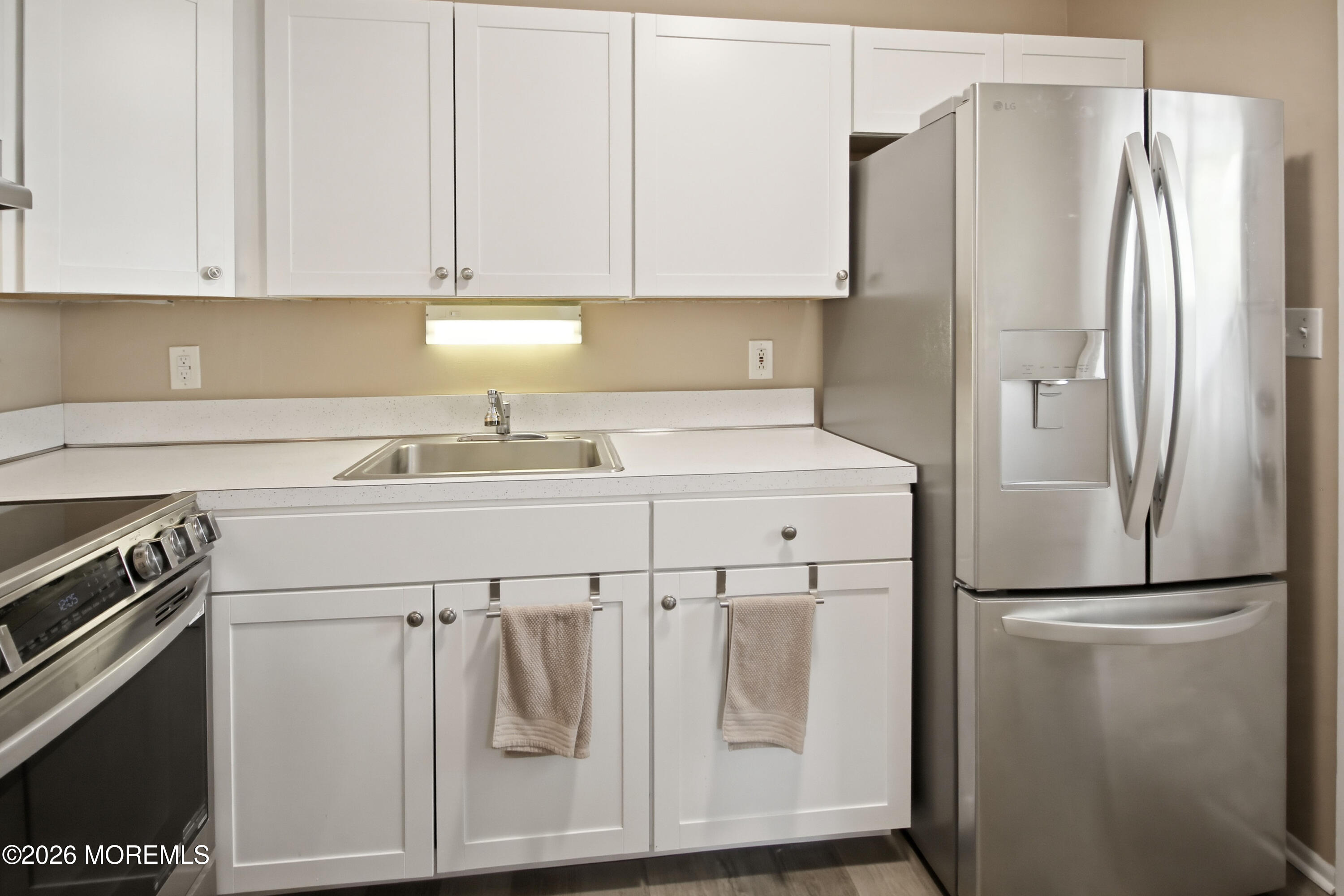 22 A Roosevelt City Road Whiting, NJ 08759 - Photo 8 of 18 a kitchen with appliances a sink and cabinets