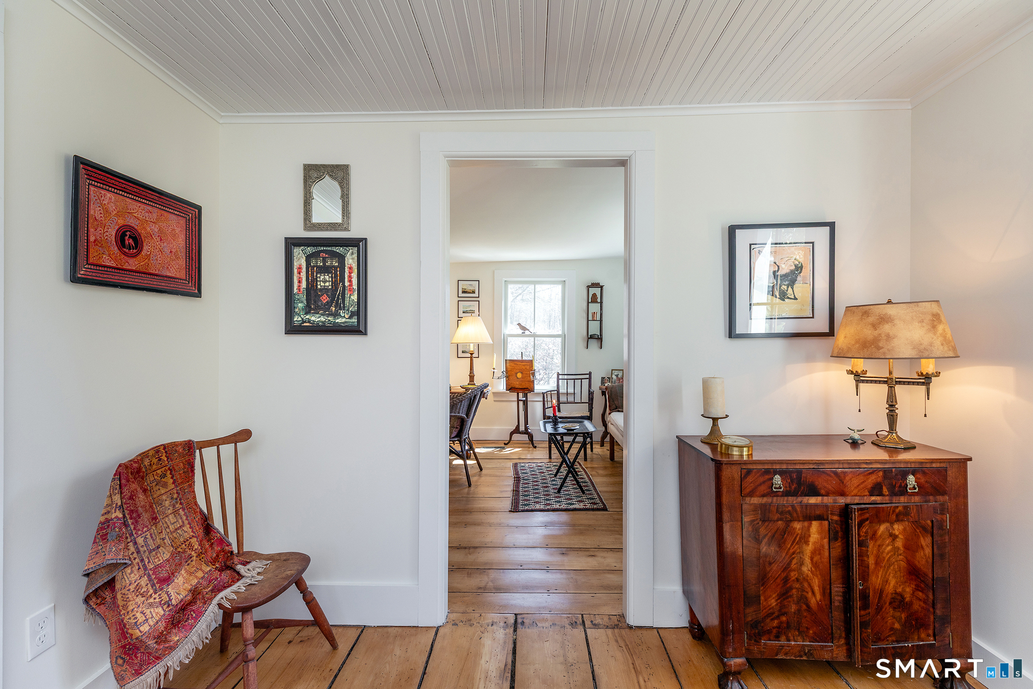 51 Mill Street Hartland, CT 06065 - Photo 14 of 36 a view of a dining room with furniture and wooden floor