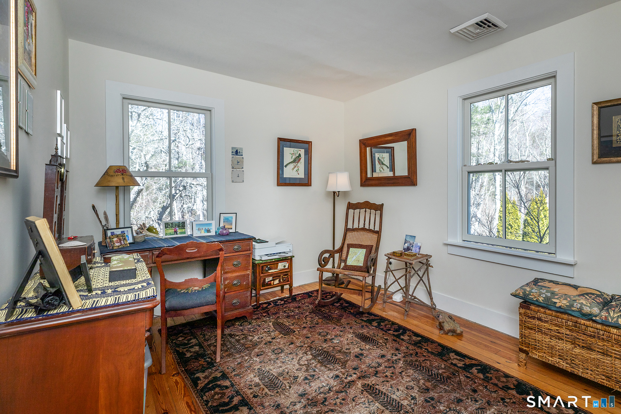 51 Mill Street Hartland, CT 06065 - Photo 25 of 36 a living room with furniture a rug and a window