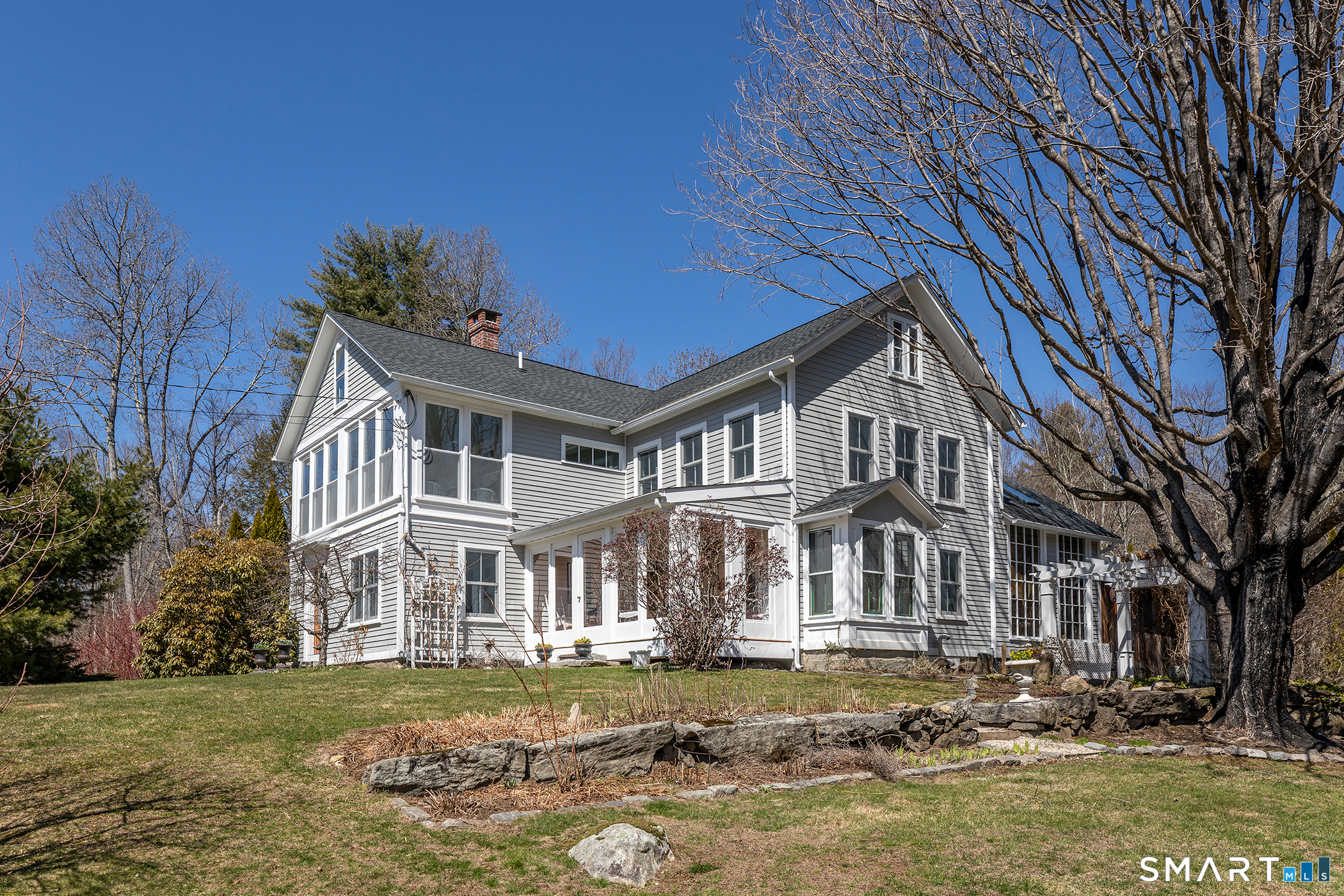 51 Mill Street Hartland, CT 06065 - Photo 35 of 36 a front view of a house with a yard
